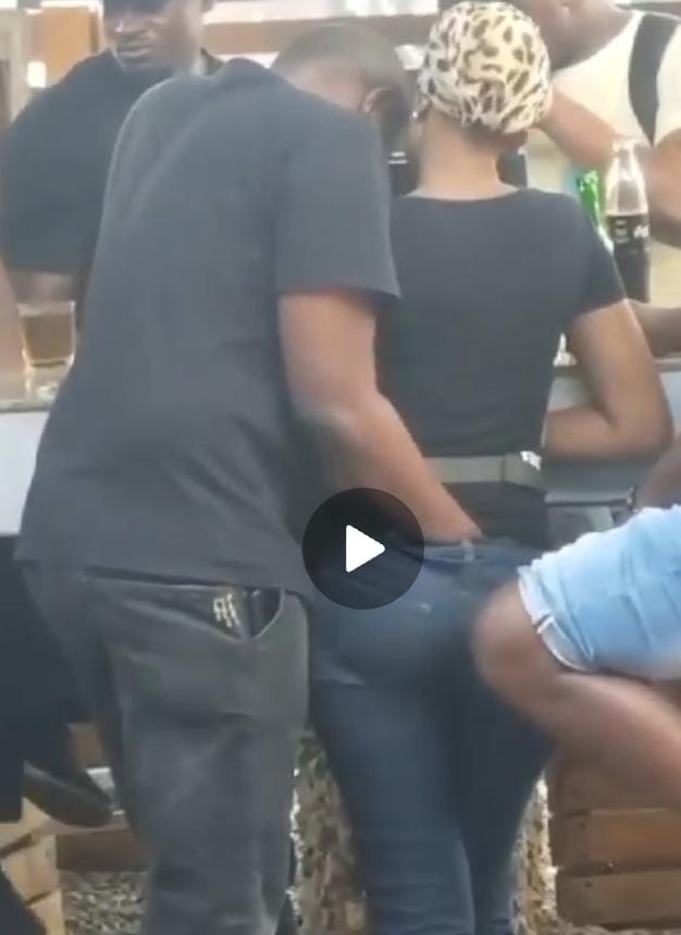 Bar man fingering female customer in public
